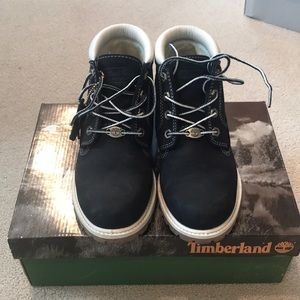Black and white Timberland boots